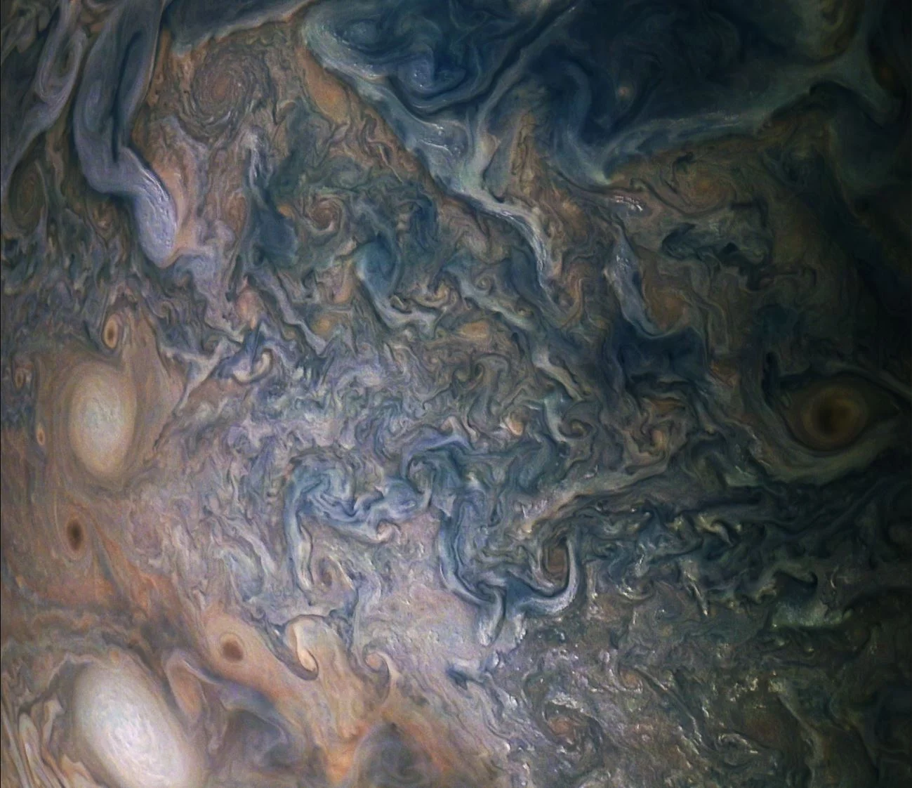 A multitude of bright white "pop-up" storms in this Jupiter cloudscape appear in this image from NASA's Juno spacecraft. This color-enhanced image was taken at 1:55 p.m. PDT (4:55 p.m. EDT) on Oct. 29, 2018, as the spacecraft performed its 16th clos…