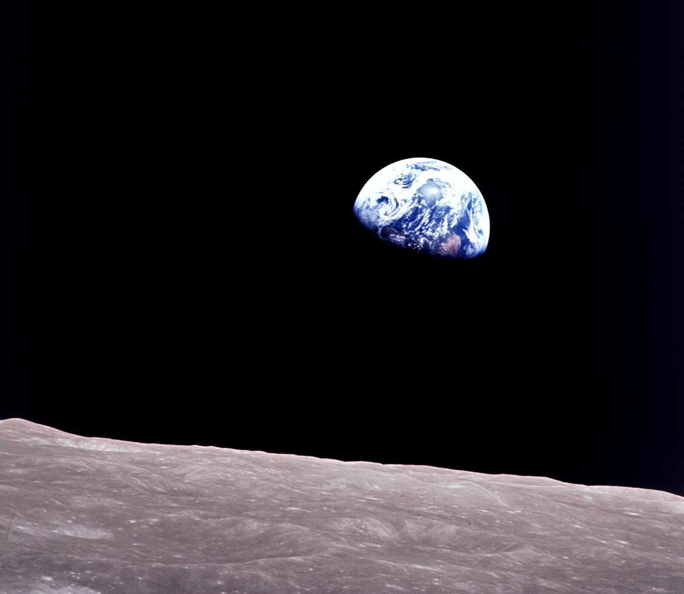 Earthrise: astronauts aboard Apollo 8 captured this spectacular photo of Earth rising above the lunar horizon as they emerged from behind the dark side of the Moon. - Image Credit: NASA