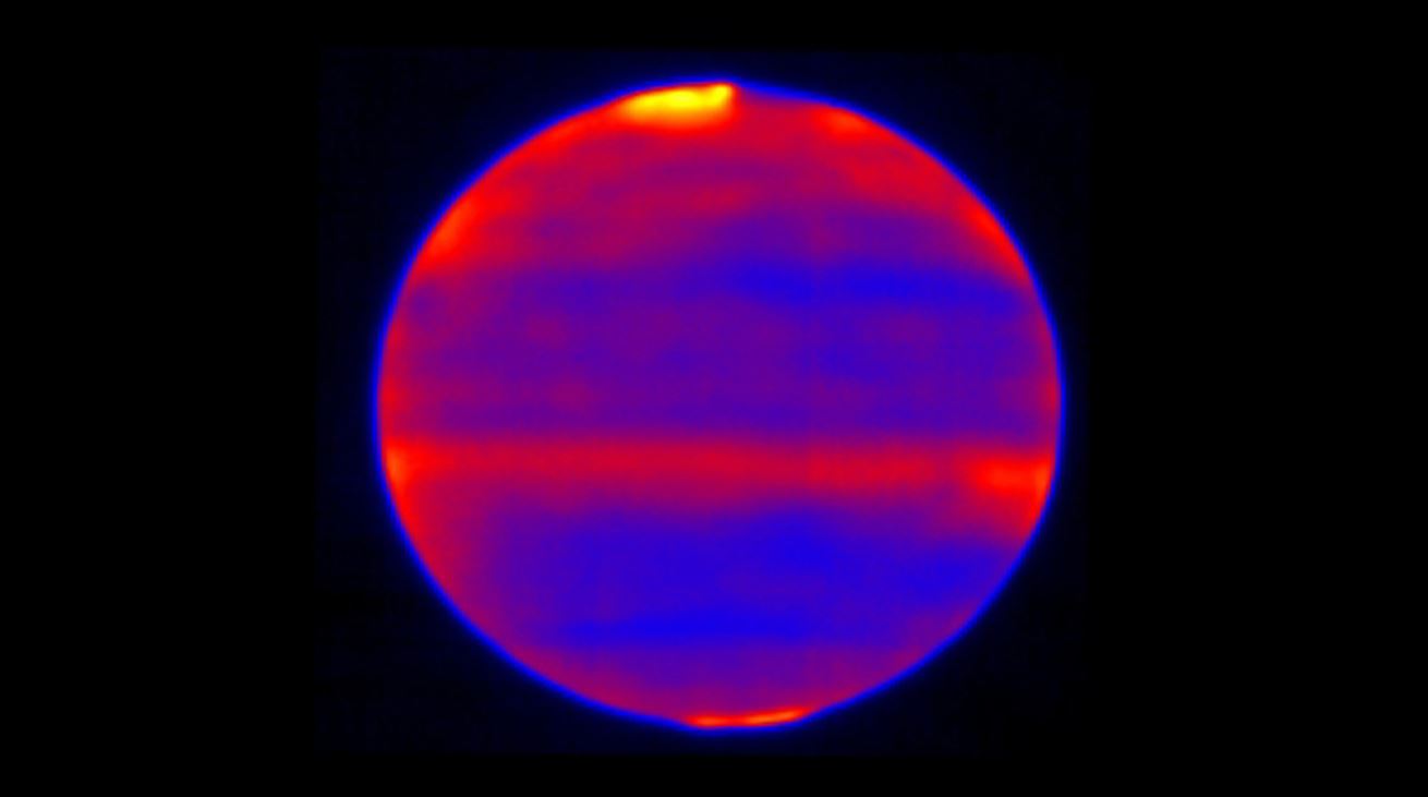 Scientists used red, blue and yellow to infuse this infrared image of Jupiter's atmosphere (red and yellow indicate the hotter regions), which was recorded by the Cooled Mid-Infrared Camera and Spectrograph (COMICS) at the Subaru Telescope on the summit of Mauna Kea, Hawaii on Jan. 12, 2017. - Image Credits: NAOJ and NASA/JPL-Caltech