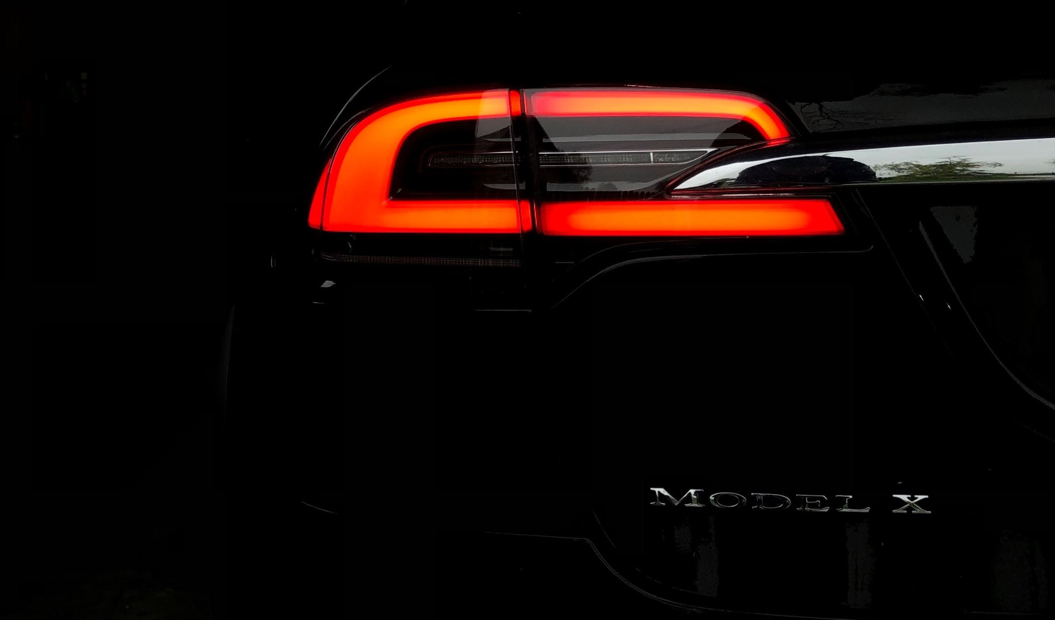 Tesla model X tail light - Image Credit: Syzmon Kita via Unsplash