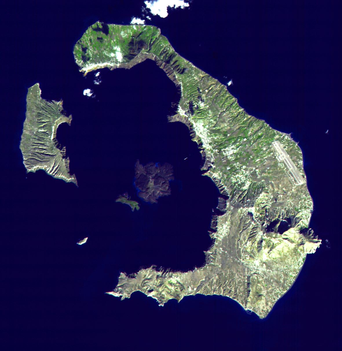 The Greek islands of Santorini form the perimeter of a volcano whose last major explosion happened about 3,400 years ago. Now the center of the crater-like caldera is filled with seawater - Image Credit:. NASA/GSFC/METI/ERSDAC/JAROS and U.S./Japan ASTER Science Team , CC BY