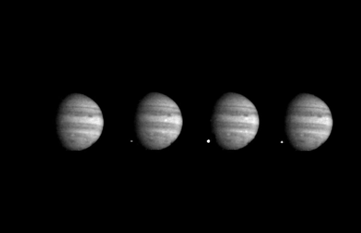 These 4 images of Jupiter and the luminous night-side impact of fragment W of Comet Shoemaker-Levy 9 were taken by the Galileo spacecraft on July 22, 1994. The spacecraft was 238 million kilometers (148 million miles) from Jupiter at the time, and 621 million kilometers from Earth. Galileo was about 40 degrees from Earth's line of sight to Jupiter, permitting this direct view. The images were taken at intervals of 2 1/3 seconds, using the green filter (visible light).- Image Credit: NASA/JPL