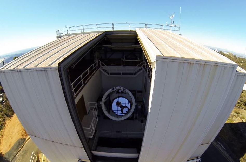 The 2.3 meter ANU telescope at Siding Spring. - Image Credits: Ssopete via Wikimedia Commons
