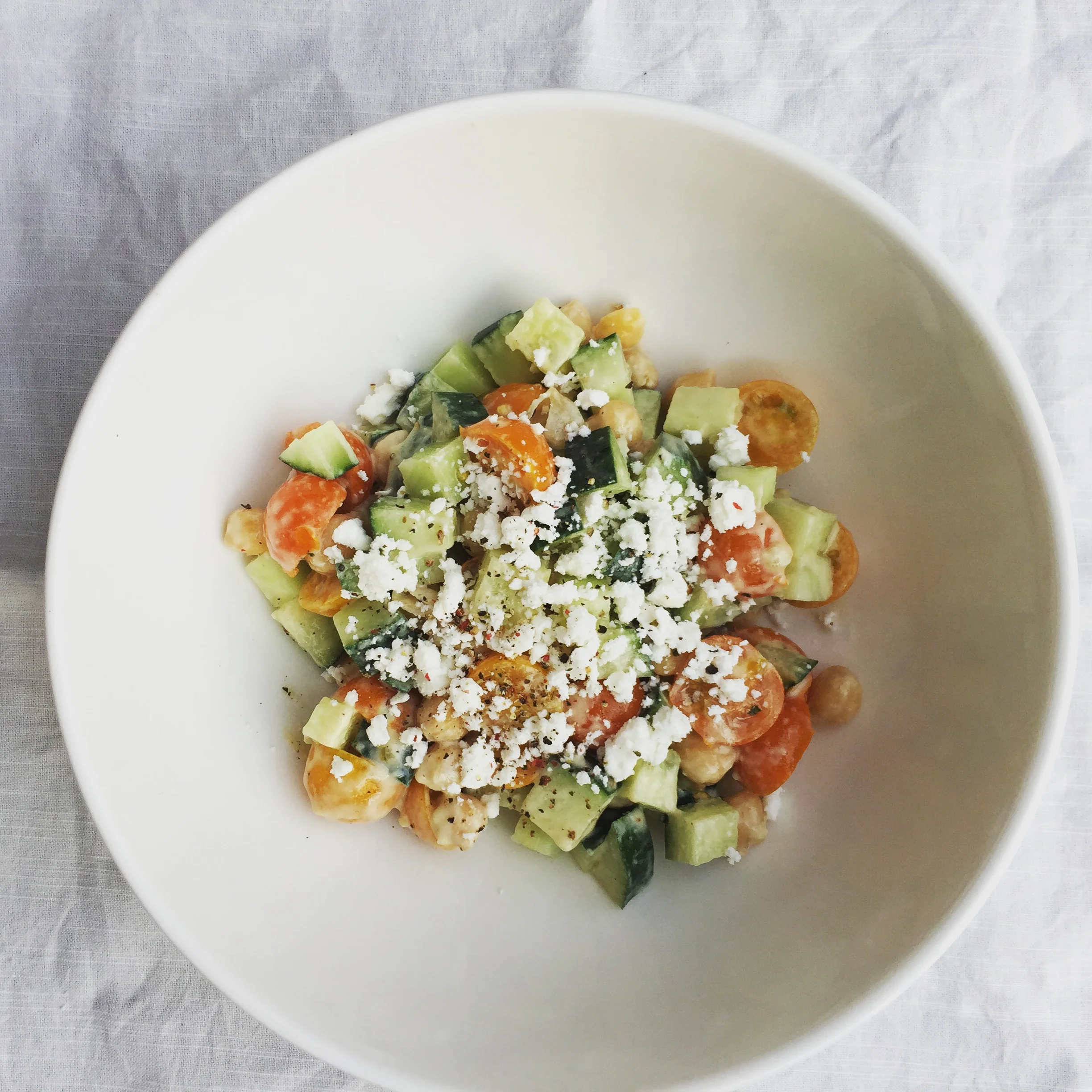 Chickpea, Tomato, Cucumber Salad with Tahini Lemon Sauce
