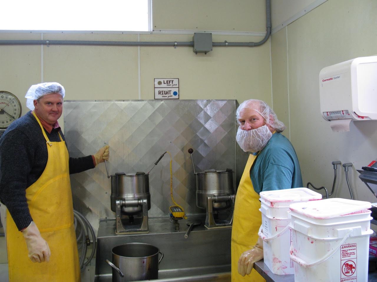 Anthony (left) at the vat. 