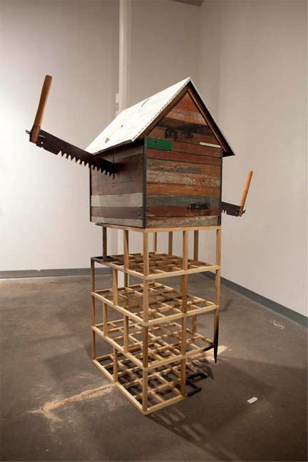 mao_4.jpeg_to gut 2011. wood steel tin saw sawdust silkscreen on wood paint. 65x22x35x48 inches..jpg