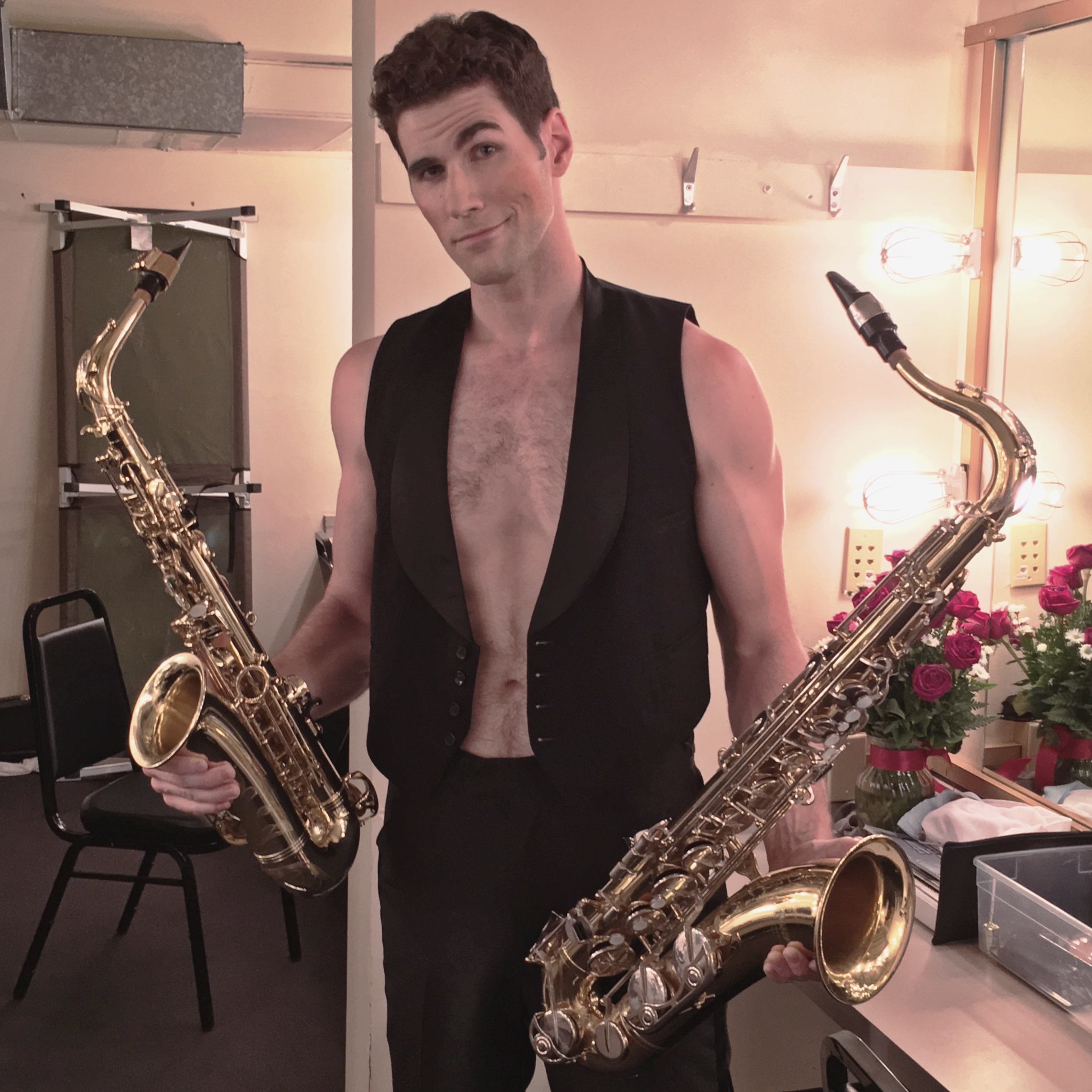 Hans, a saxophone-playing man of the Kit Kat Klub