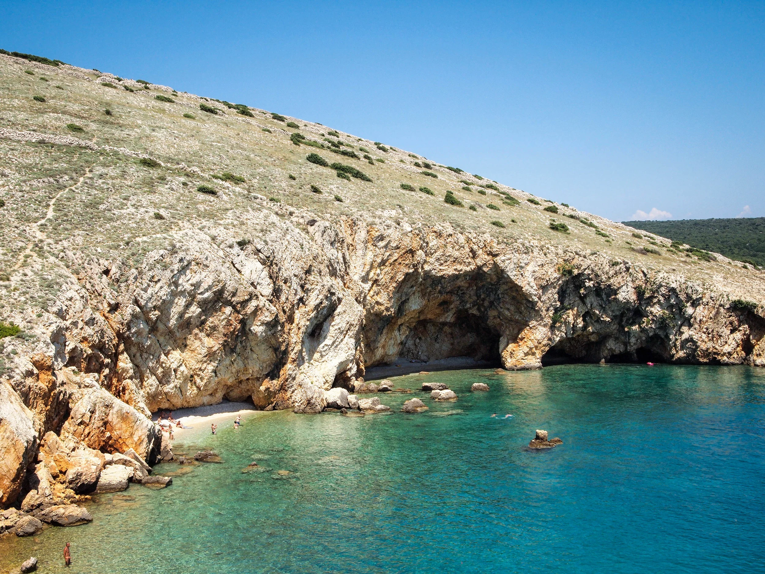 Why is the island of Cres a perfect high-season holiday destination?