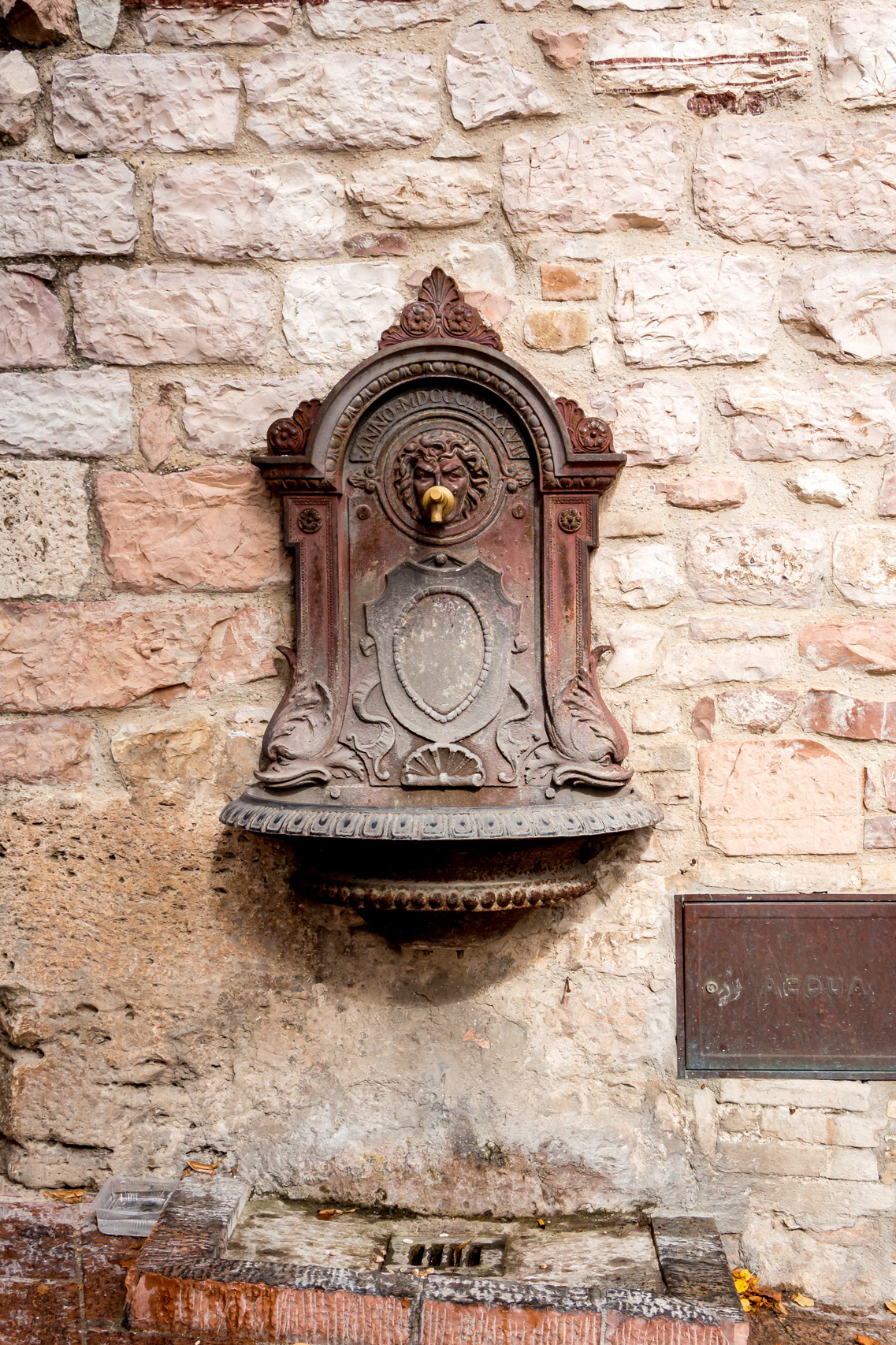 Water faucet in Assisi, Italy