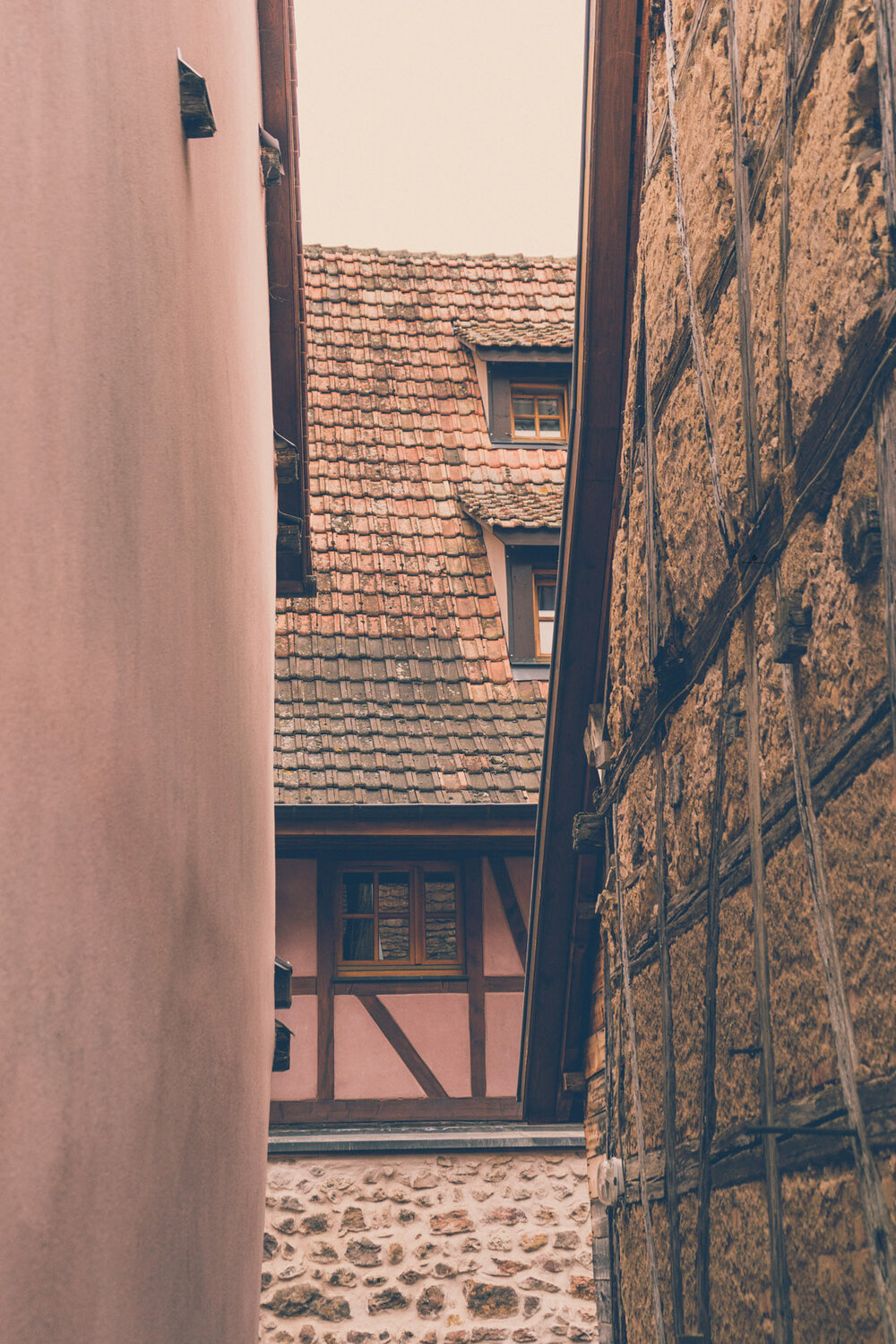 Peach-colored houses in Eguisheim