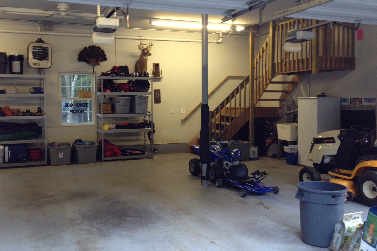 The garage after! All organized and ready for cars to be parked in it.