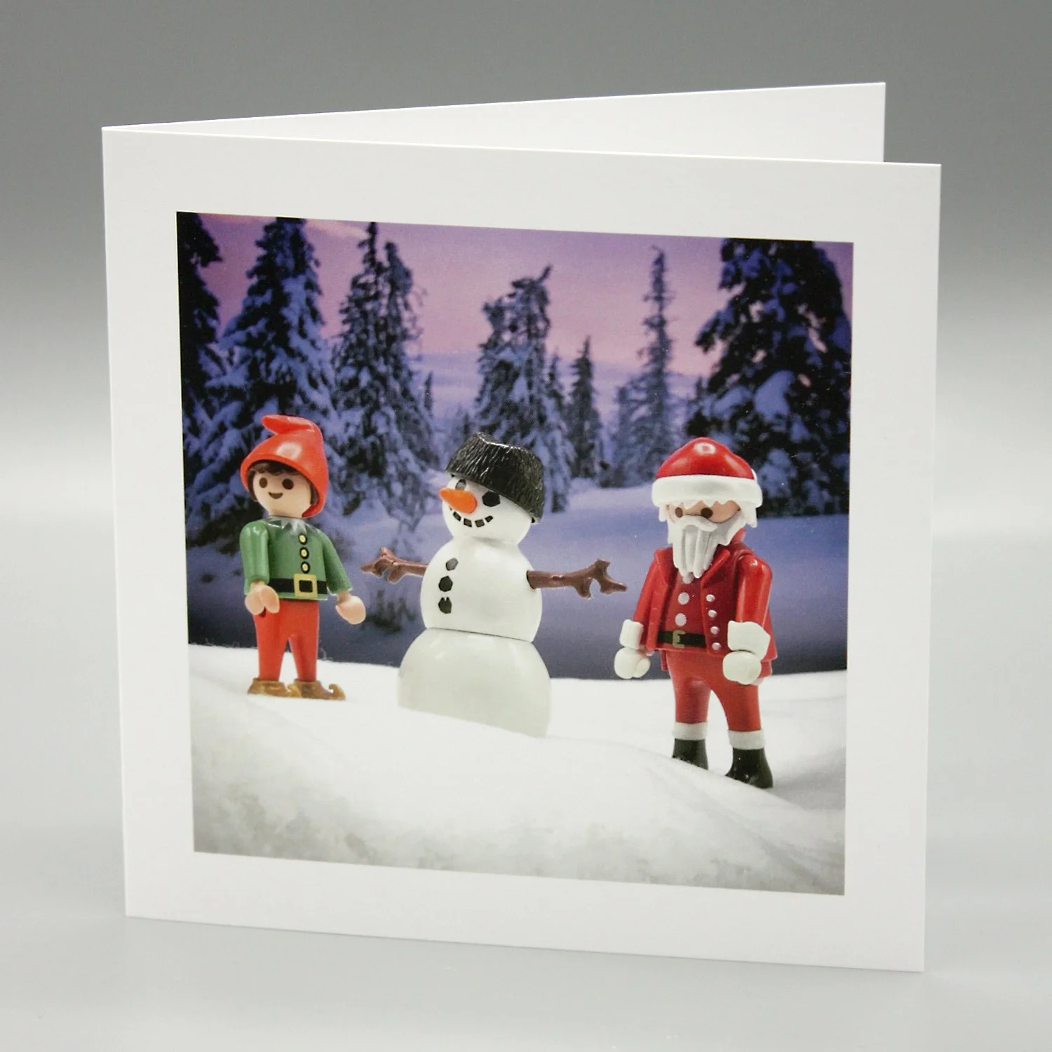Santa and Elf make a Snowman!