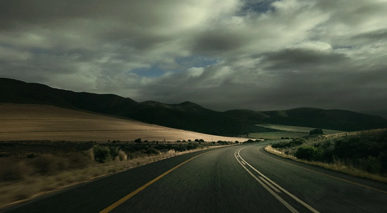 driving-open-road-landscape-sacha-waldman.jpg