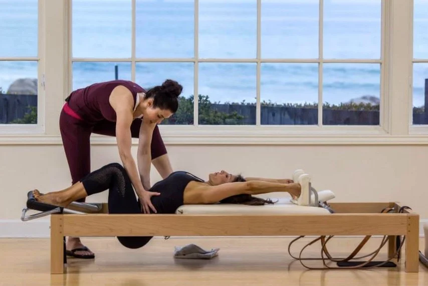 MeJo Wiggin teaching the Semi Circle during a Reformer class for online classes with Pilates Anytime.