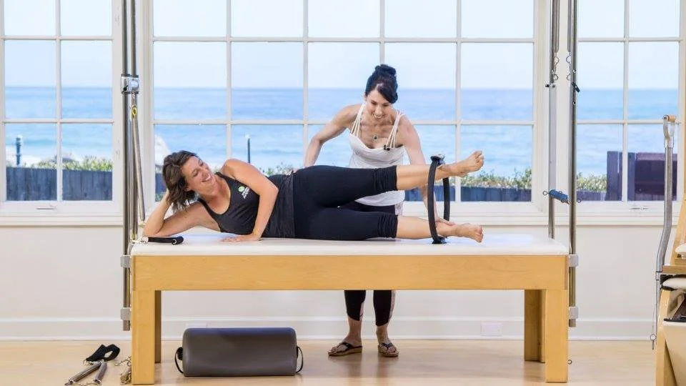 MeJo Wiggin teaching on the Classical Pilates Cadillac.