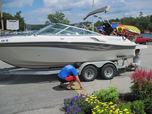 Lake Host performing a courtesy boat inspection