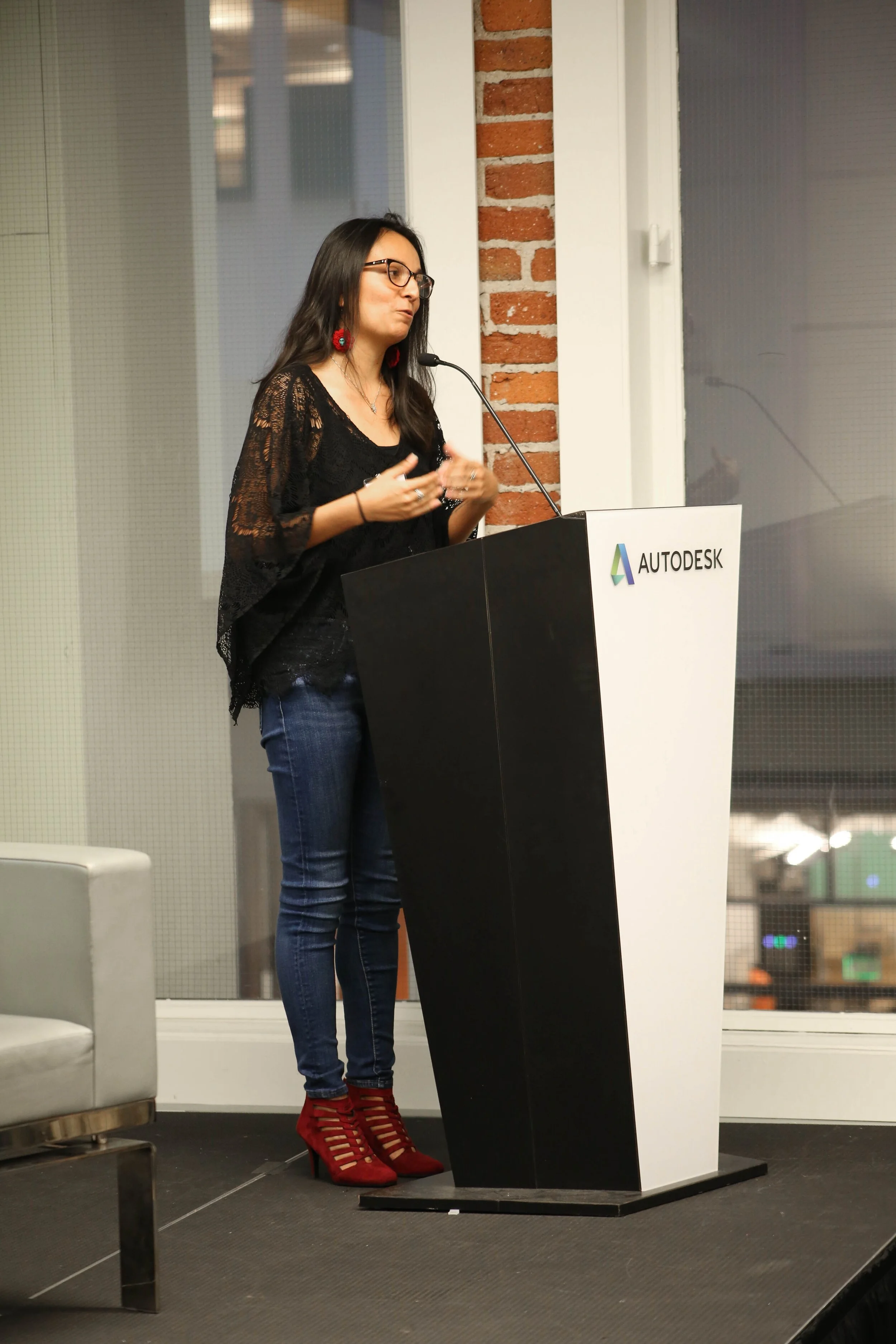  Giving closing remarks at fundraising event with guest of honor, Anita Hill 