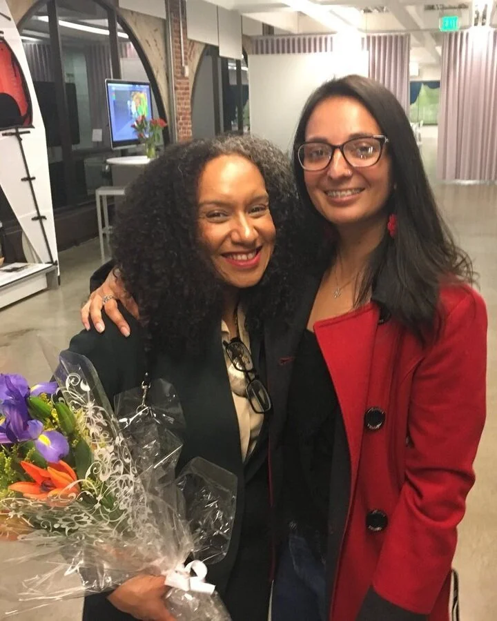  Celebrating with Claudia Cruz, journalist at CNET en Español, after she interviewed Anita Hill 