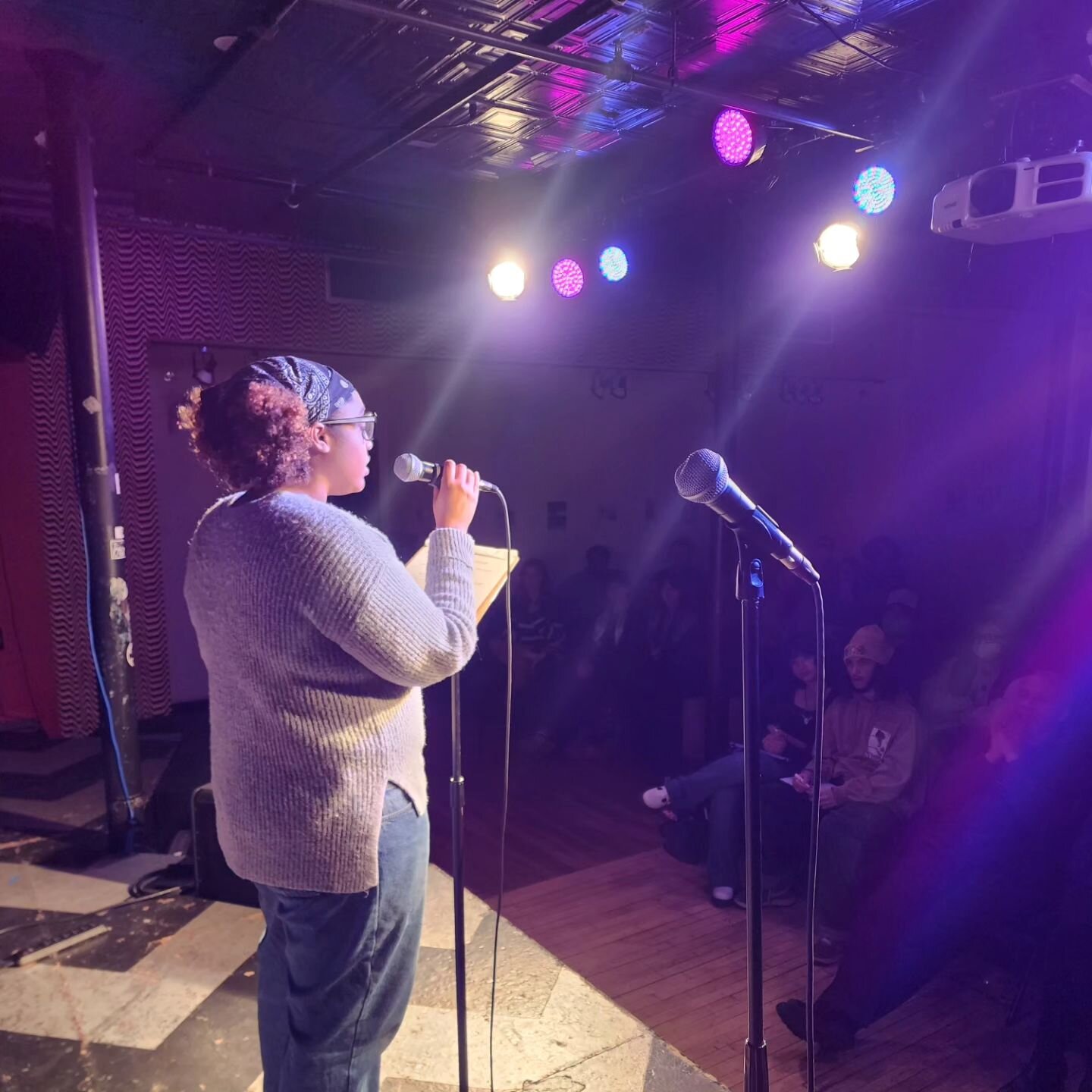 Thank you to everyone who came out for last night's open mic and poetry slam! You all packed both lists and we heard some great poems, stories and music. Congrats to Sherai and Angel, who advance to finals in May! Thank you to the volunteer judges an