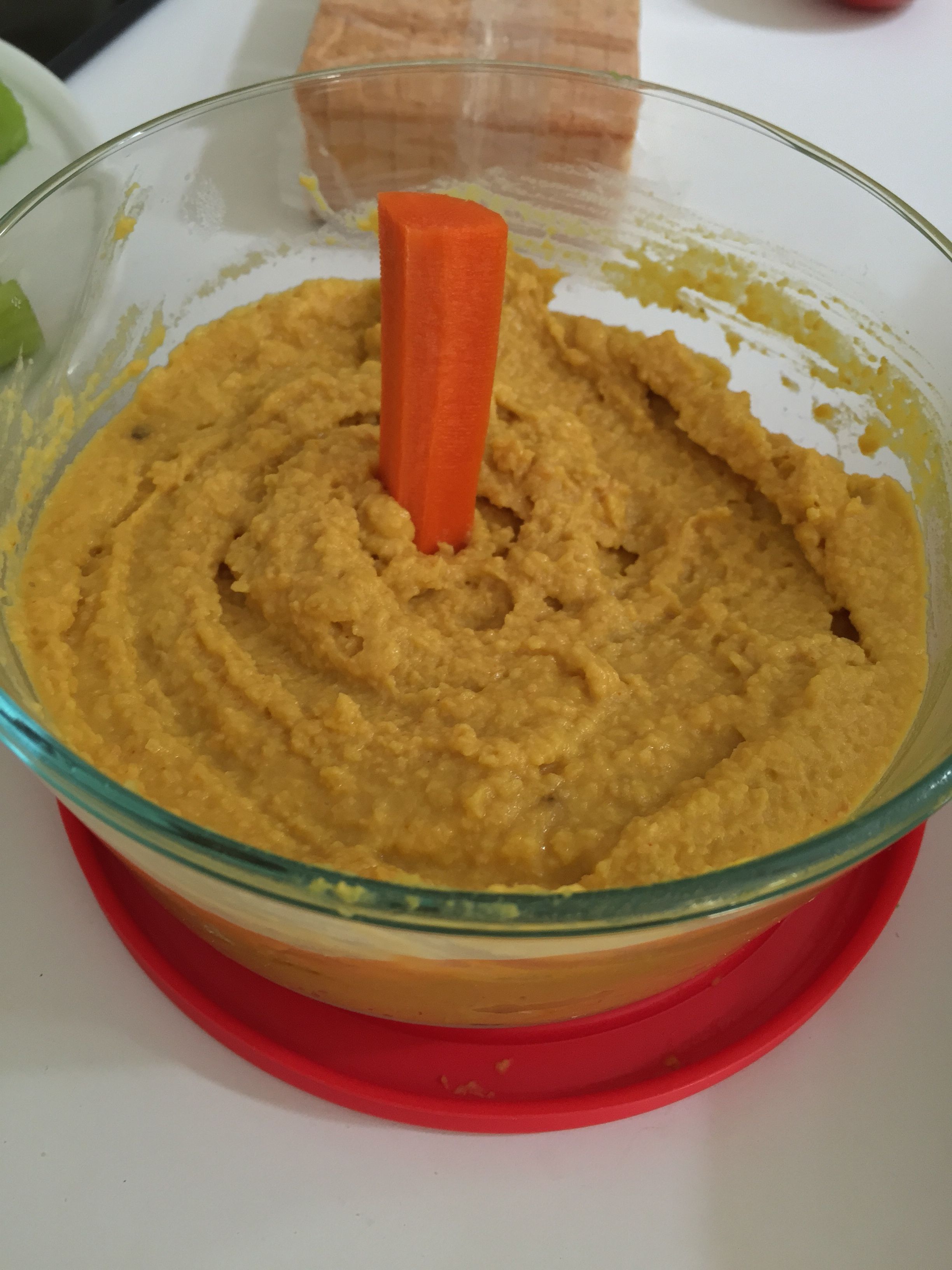Completely utilitarian, non-styled photo of Sweet Golden Beet Hummus. 