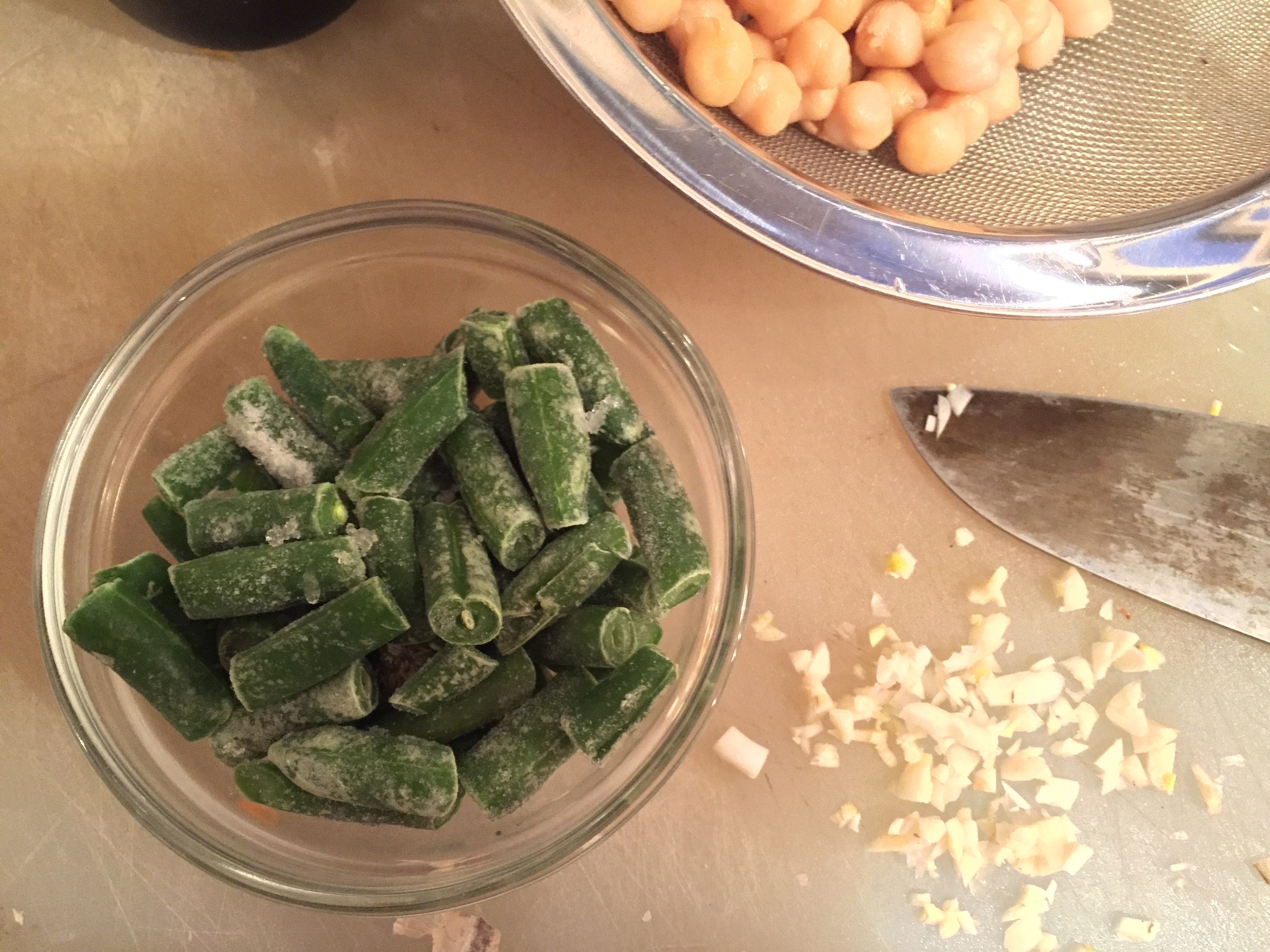Frozen green beans, fresh garlic, garbanzo beans. Makeshift minestrone is on the way!