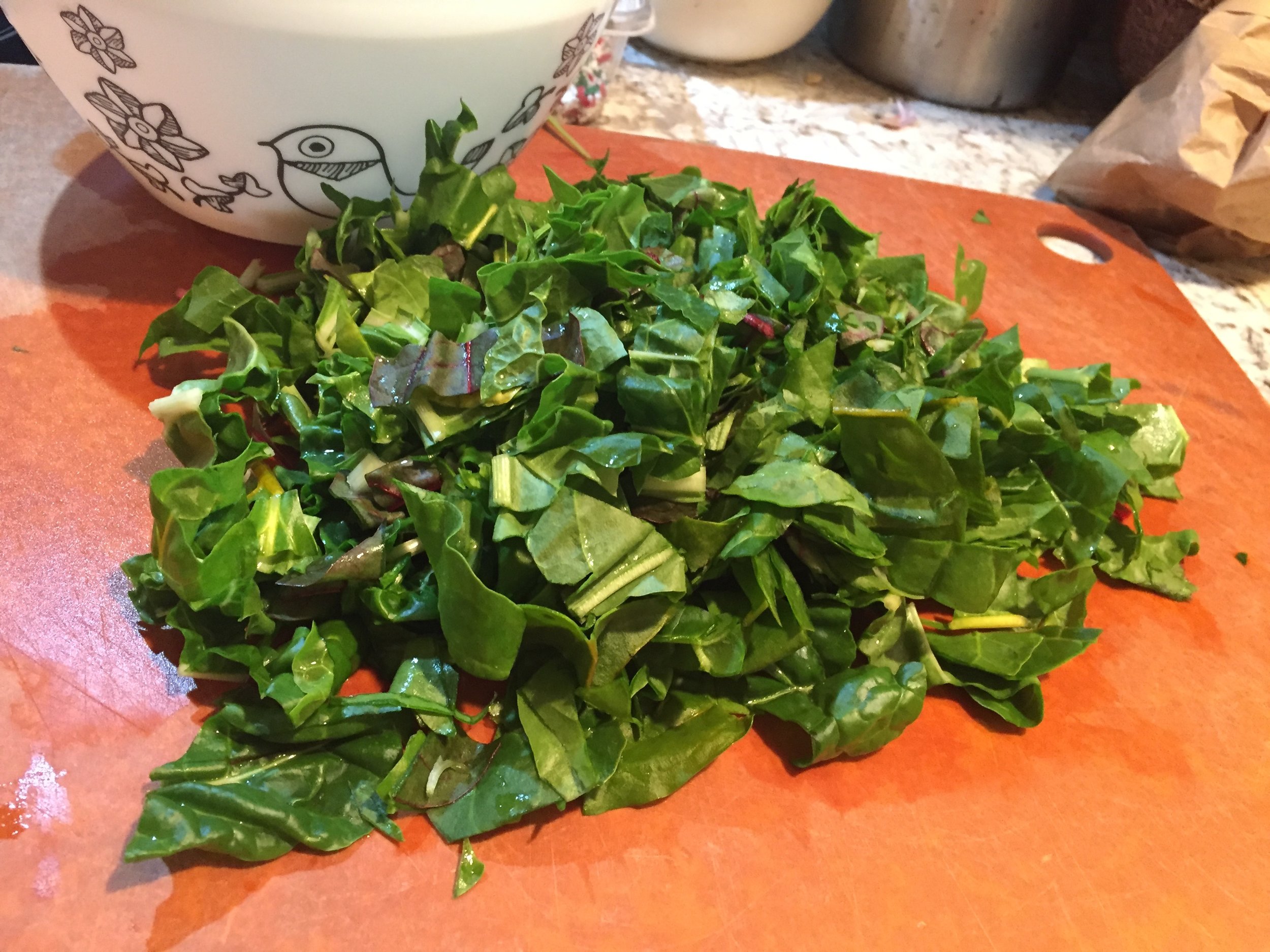Baby Swiss chard, chopped roughly and ready to wilt in the sunny gingery dal. 
