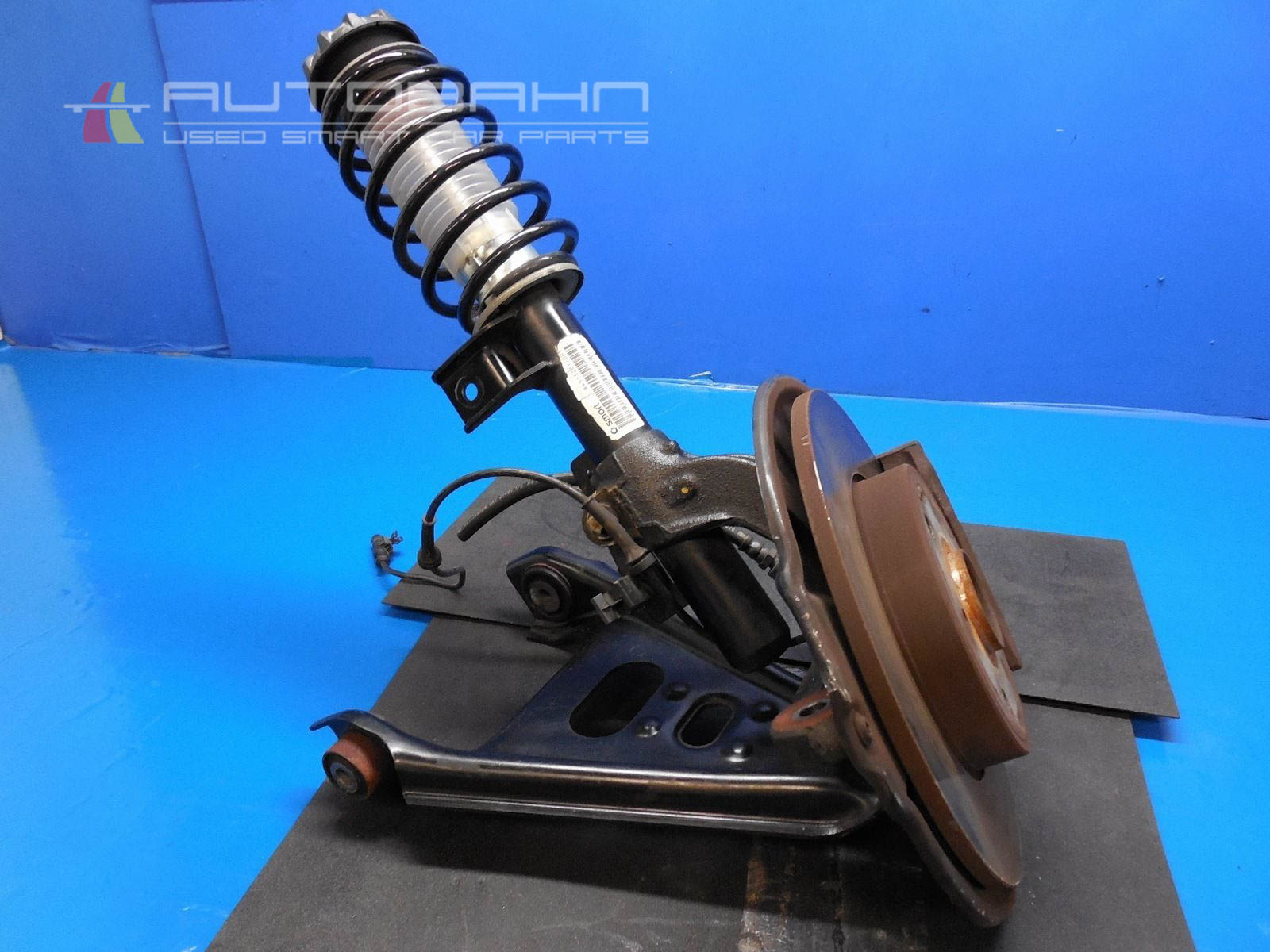 Fortwo OEM Front Left Control Arm-Spindle-Brake-Strut-Spring Assembly 01.jpg
