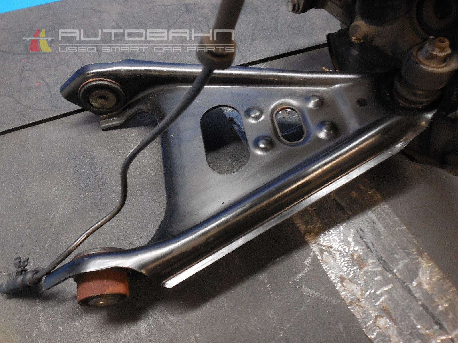 Fortwo OEM Front Left Control Arm-Spindle-Brake-Strut-Spring Assembly 02.jpg