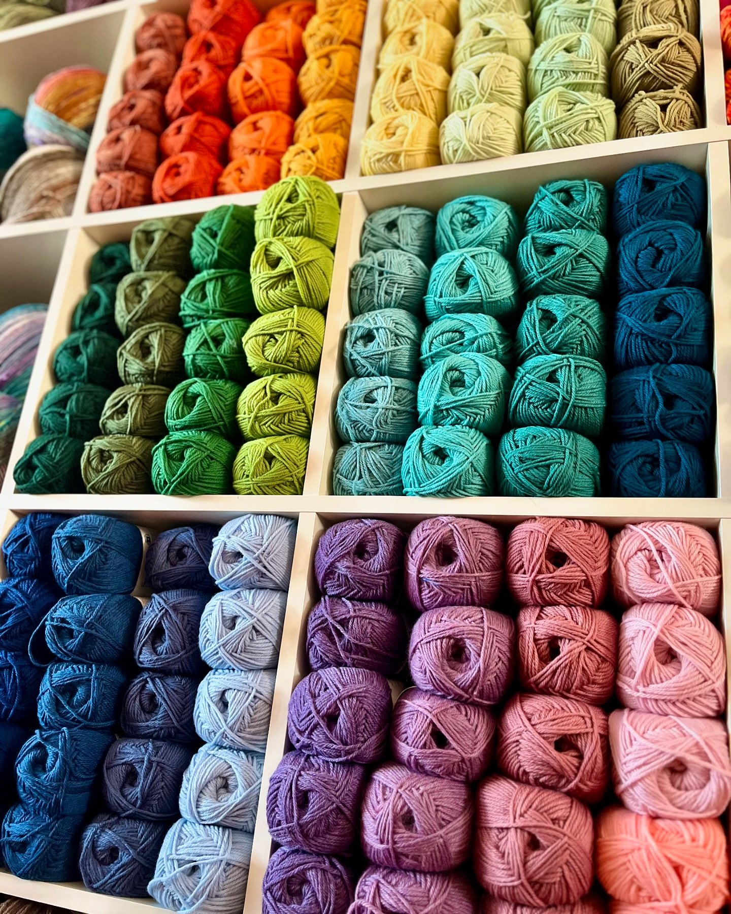 BIG superwash yarn restock! We have a rainbow of colors in both bulky and worsted weight solids, plus a whole column of superwash multi colors! Come check it out.