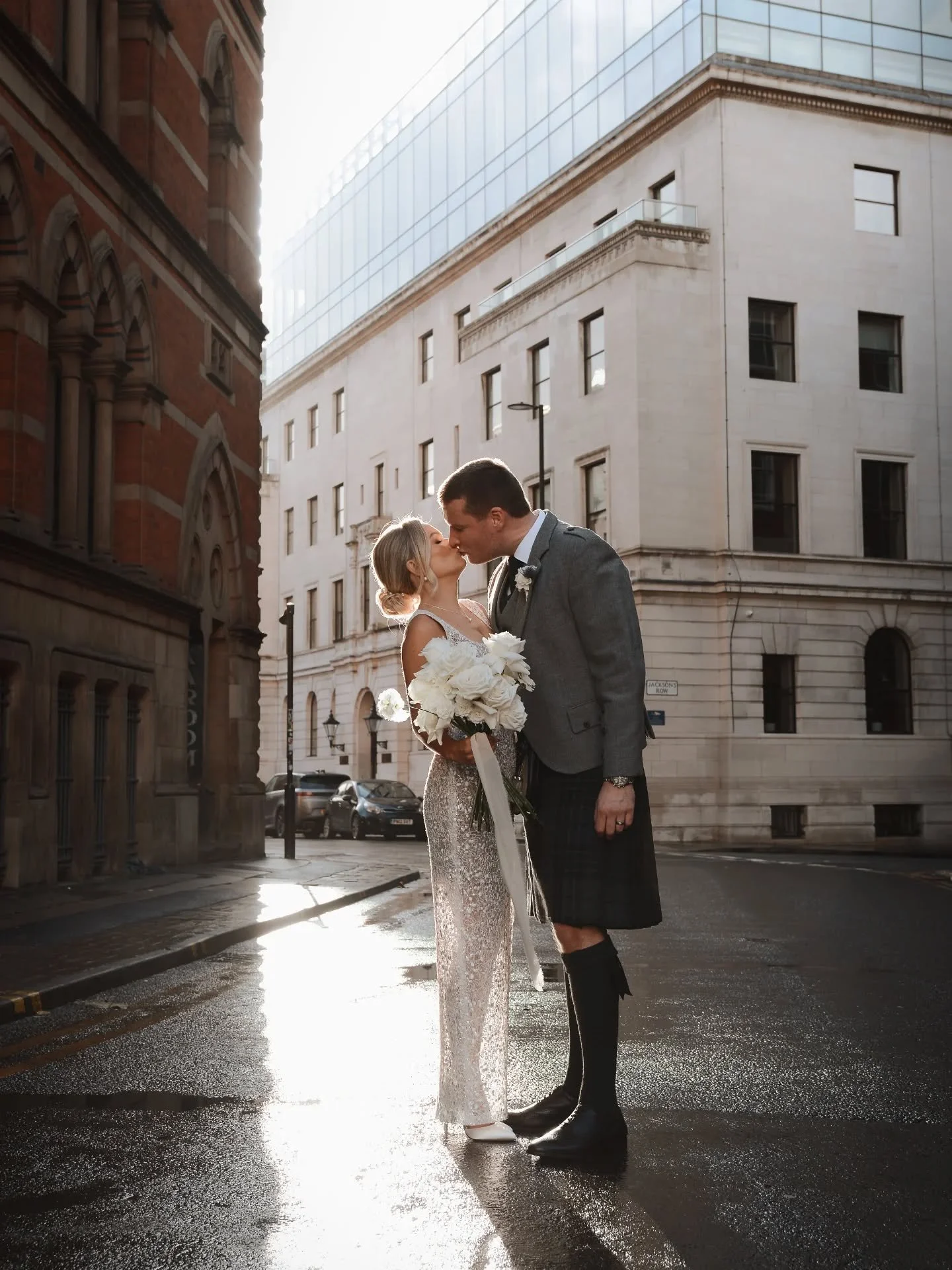 WE NEED TO TALK ABOUT THIS WEDDING. 
.
I'm in love with these photos! 💍🤍 A slightly drizzly day in Manchester, we left the registry office and the sun was beaming down the street opposite. Absolutely perfect timing, thank you photography gods! 🙌🏼