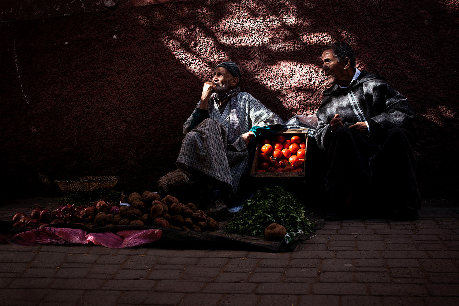 Two men in a souk in the center of Marrakech- Morocco