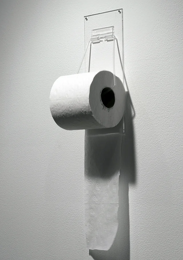 The Room of Requirement (Installation detail), 2015. Photocopies, plexiglass, pedestal, tape, toilet paper, and electric candles. Dimensions Variable