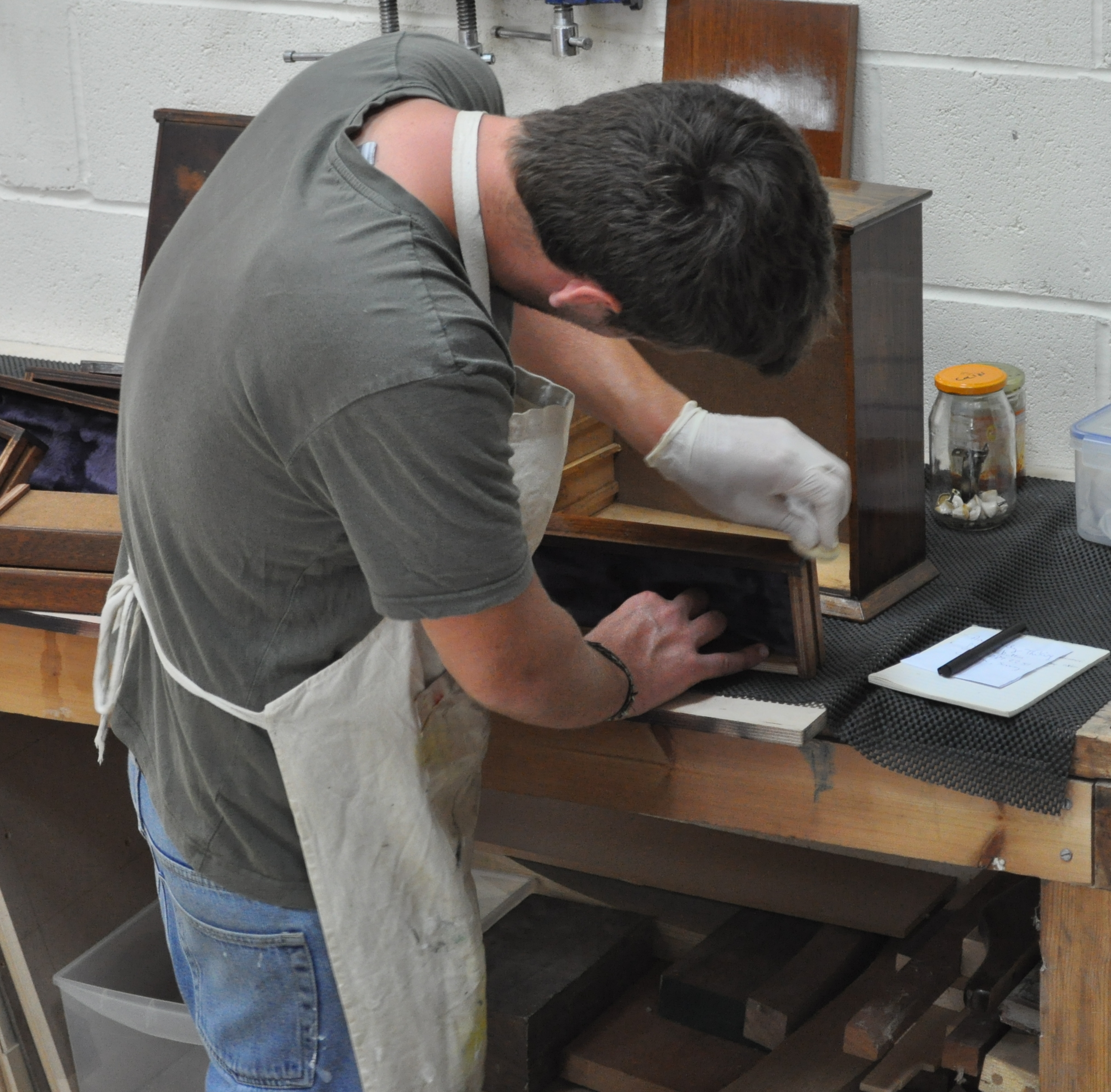 A student French Polishing a box