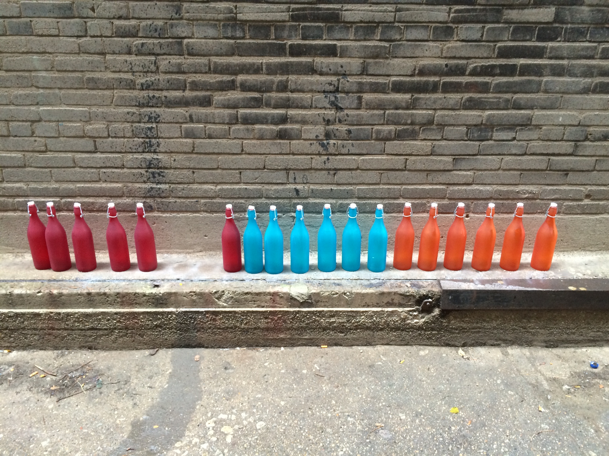 Due to constraints on the size of the necks of the bottles, and the translucence of the glass, the LED lights placed inside where not as bright as desired. In order to emphasize the light that was available, I frosted the exterior of the bottles to