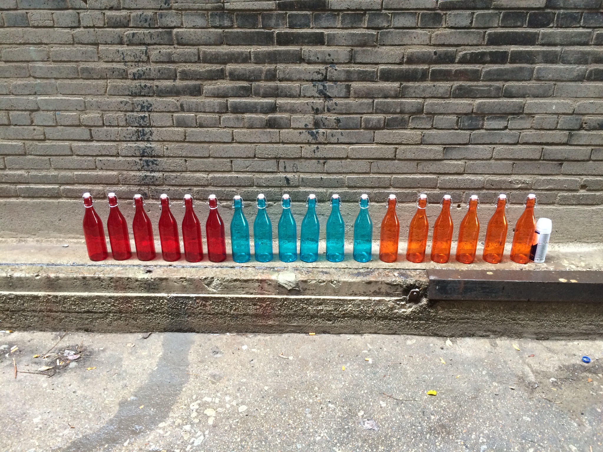 The Scenic Designer (Jesse Howe) wanted to cover the tree of the island in glowing colored bottles. The execution of this project was left up to myself and the Master Electrician (Andy Rubino). These are the bottles as they appeared initially.