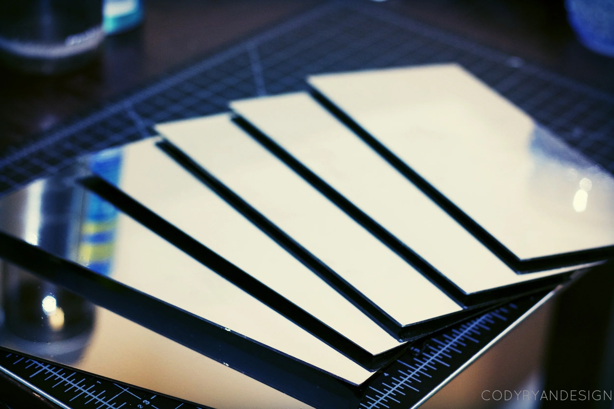 FILM APPLIED TO GLASS