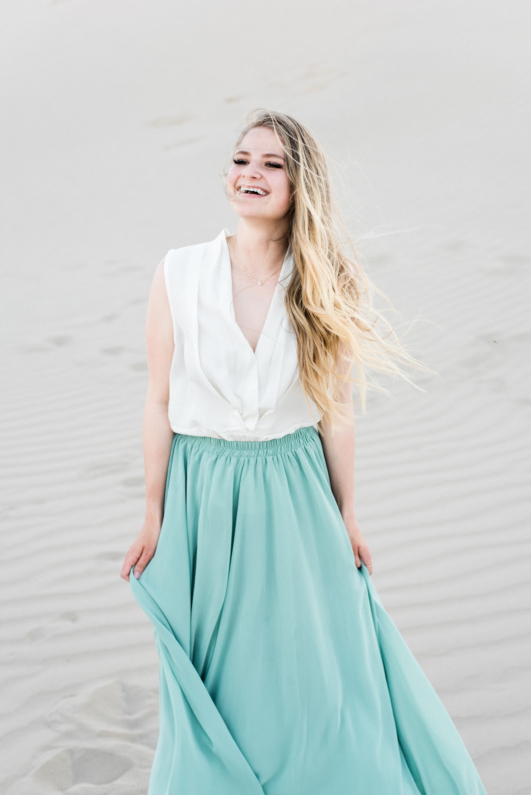 Woman faces the camera smiling