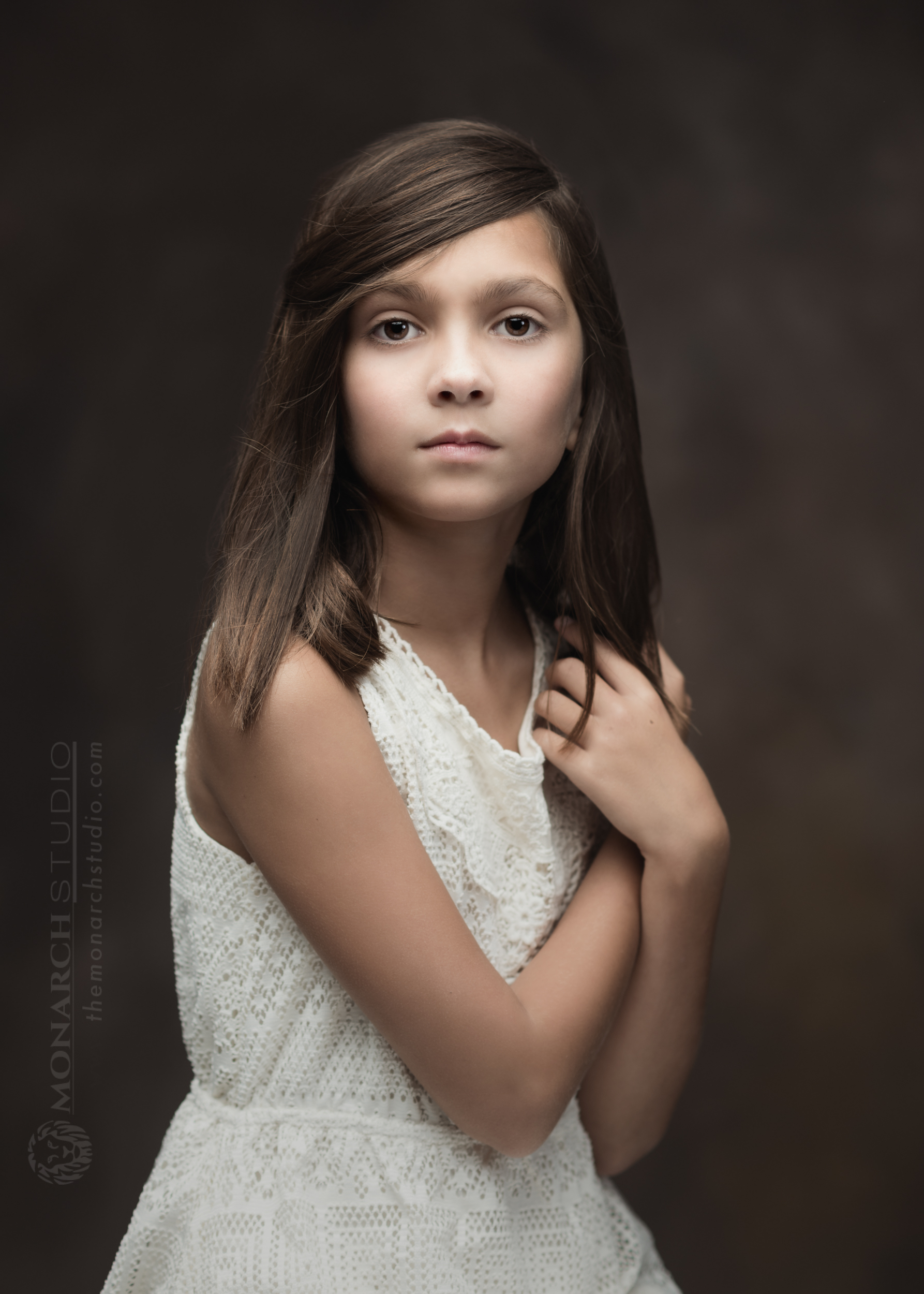 Fine art children's portraiture of girl in Florida photography studio.