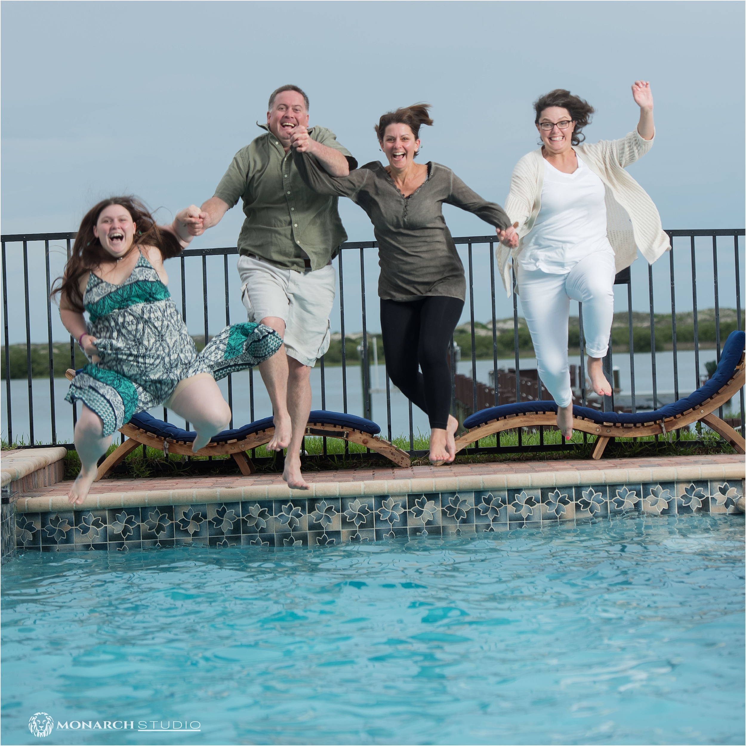 fun-family-portrait-photographer-in-st-augustine-pool.jpg