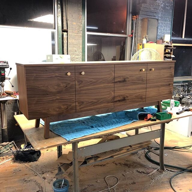 New Years resolution... post more photos! Here&rsquo;s a walnut credenza with brass hardware ready for delivery. #brushfactory #cincymade #custominteriors #cabinetry