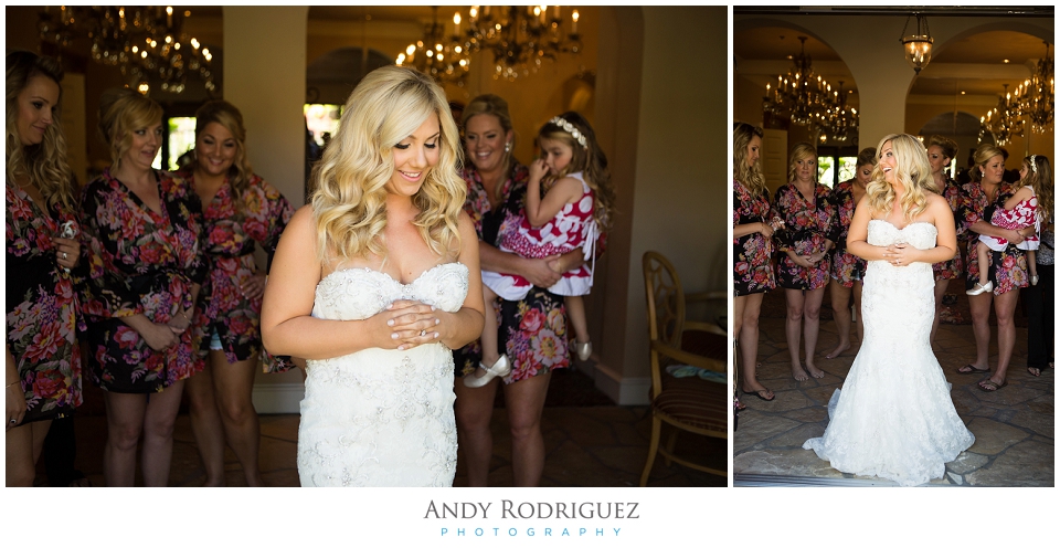 Bride getting into her dress