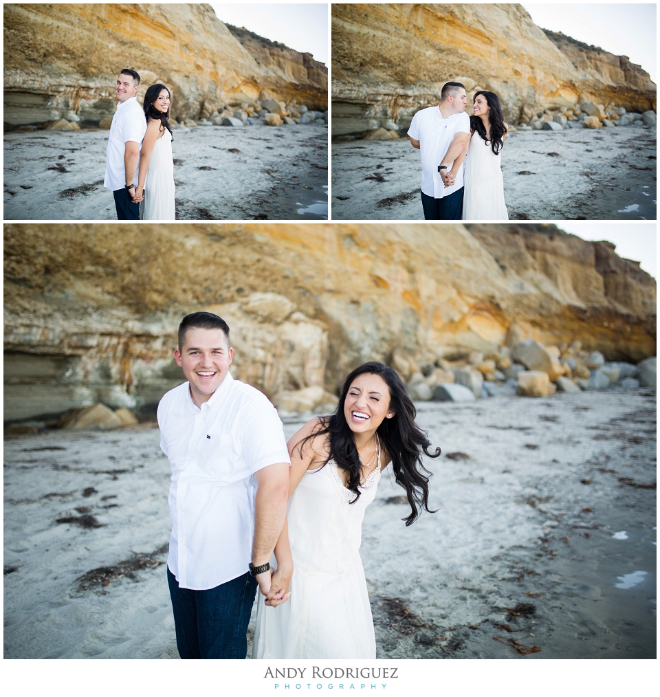 Bride and groom laughing at Scripps Beach