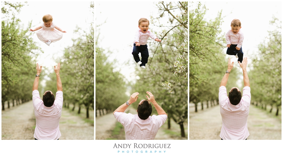 Dad throwing babies in the air