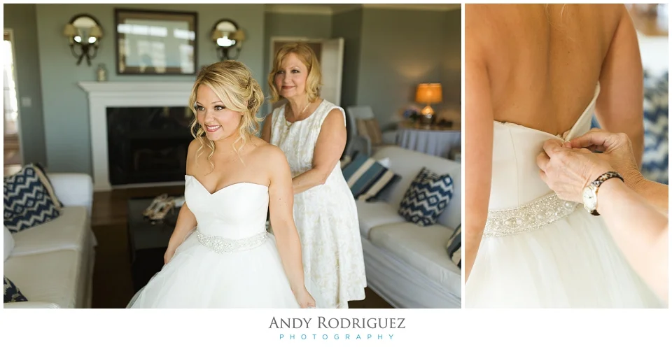 Bride getting into dress