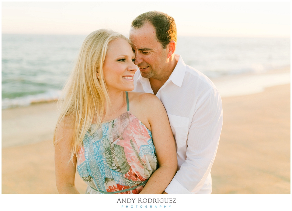 Couple laughing on the beach