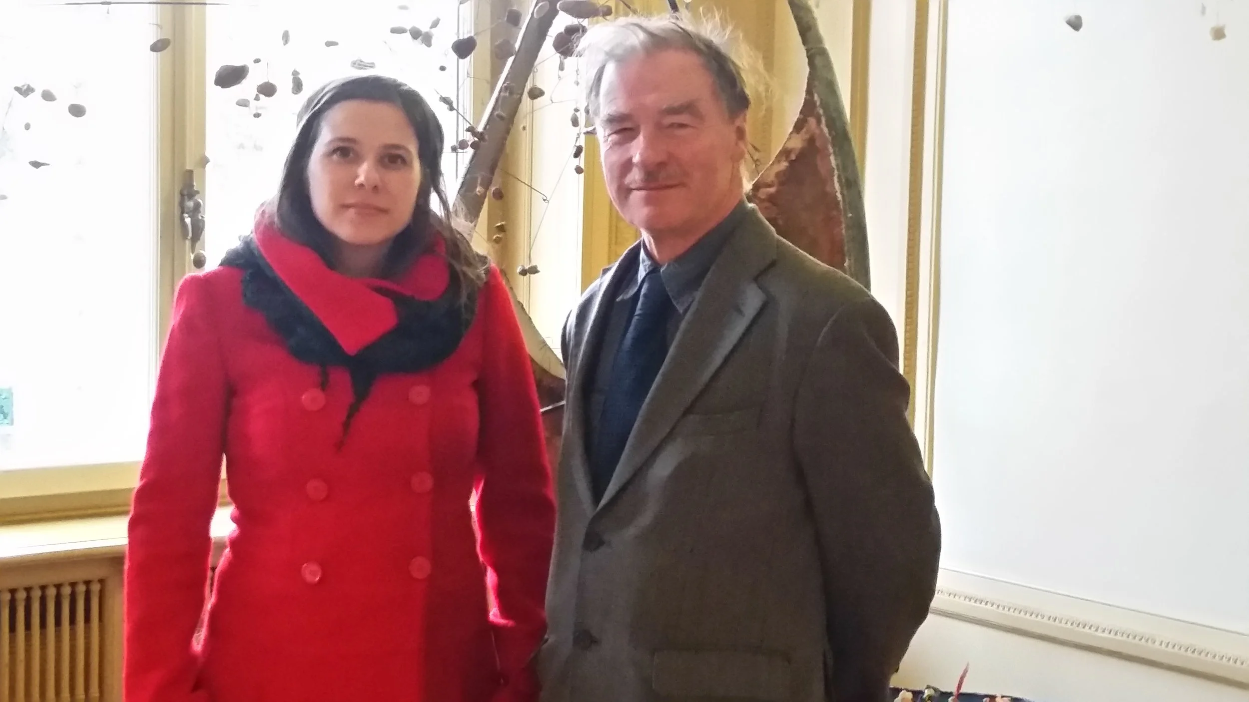 IFOR Fellow Martina Lanza (Left) and IFOR's main representative to the UN in Geneva, Derek Brett (right) inside of the Palais Wilson between meetings of the Human Rights Committee. 