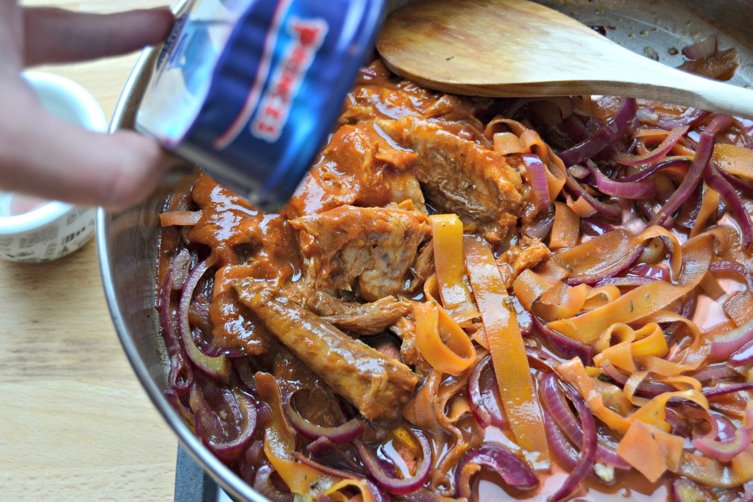 5. Open the can of Princes Mackerel in Spicy Tomato Sauce and add to the pan – the sauce and the fish.