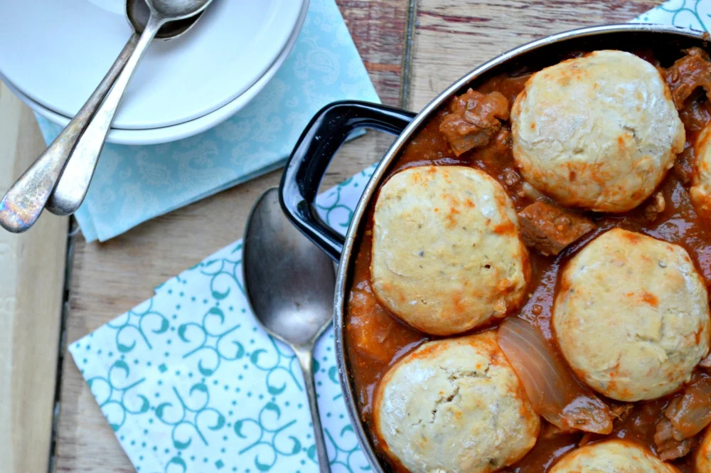 Beef stew topped with healthy dumplings made with olive oil.jpg