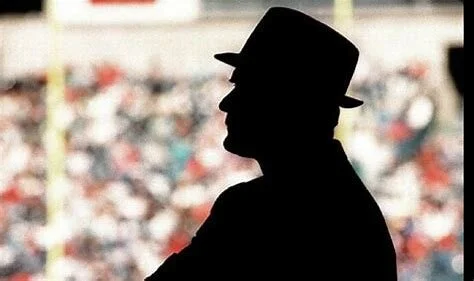 THE MAN UNDER THE HAT