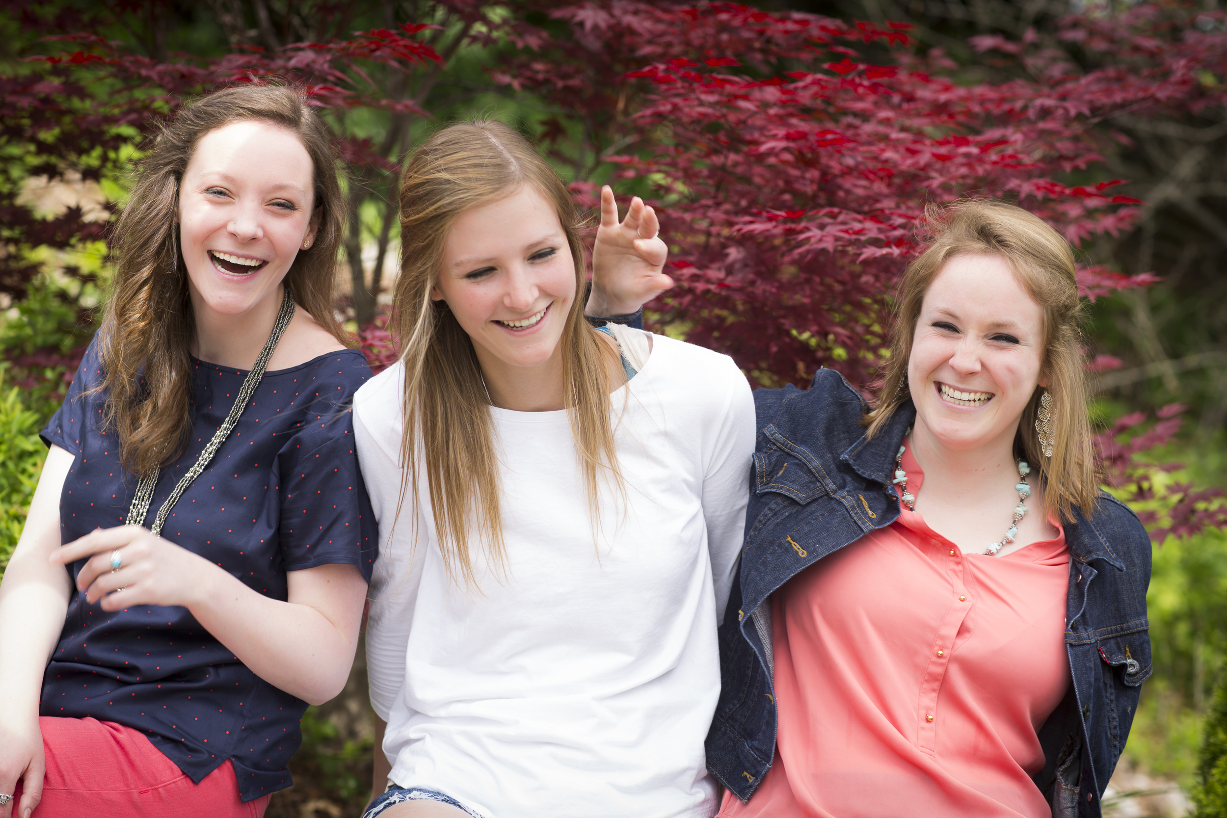 07 3 sisters family portrait outdoor session being silly maple tree.jpg